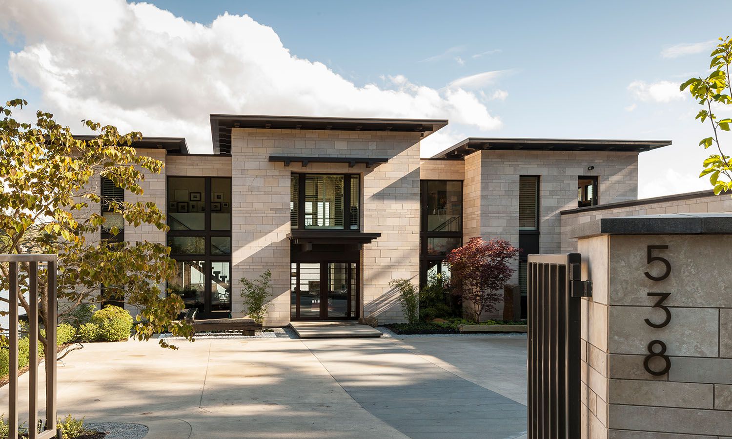 Custom home architecture brings symmetry to this lakeside Meydenbauer home.