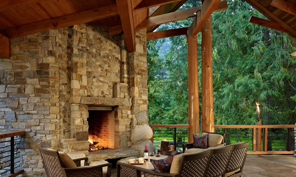 Rustic alpine outdoor fireplace