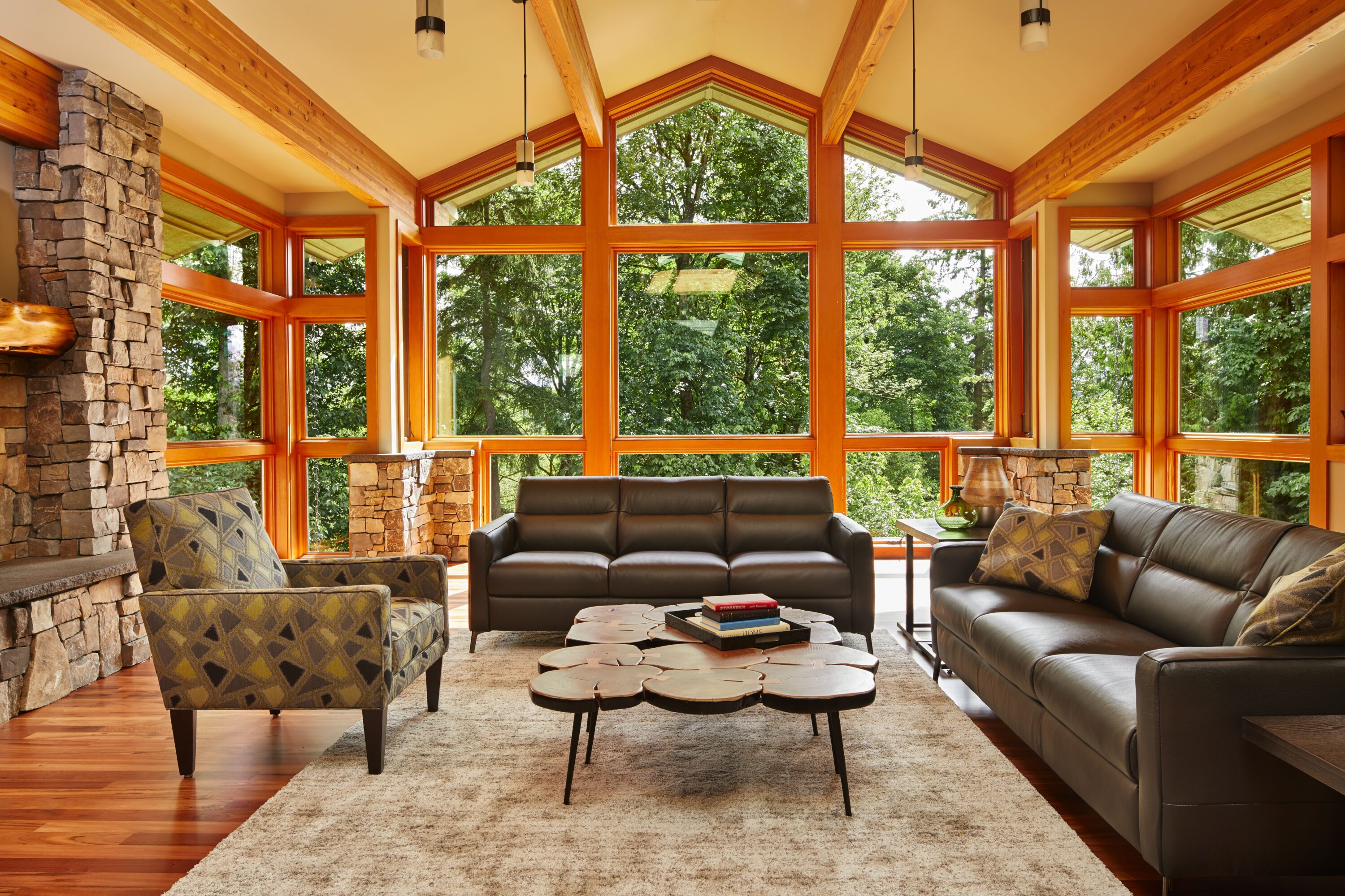 This Redmond home merges wood, glass, and stone for truly exquisite home architecture. 