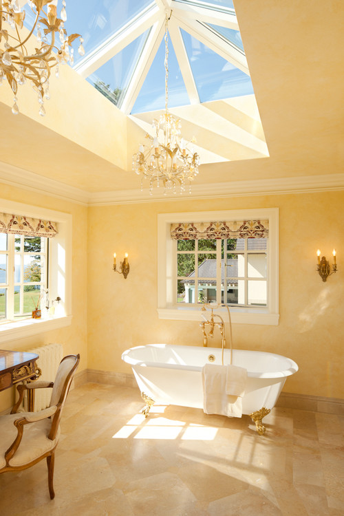 Skylights allow natural light to poor through the master bathroom