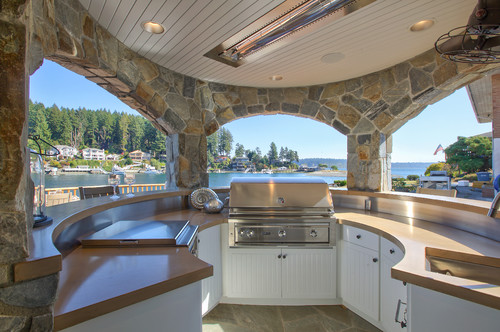 A covered outdoor kitchen designed to embrace the Pacific Northwest summer.